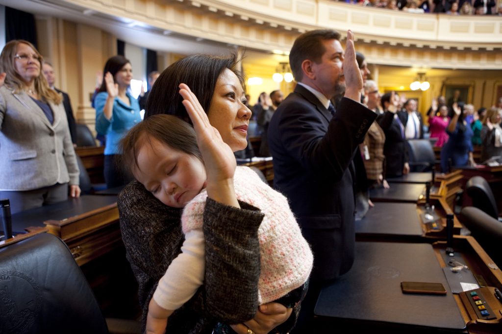 Kathy Tran for Delegate Virginia 18 taking the oath of office while holding her child